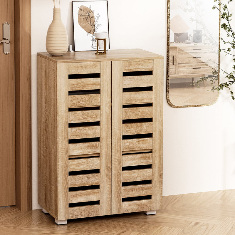 Alster shoe cabinet in pine and white with ventilated doors and adjustable shelves