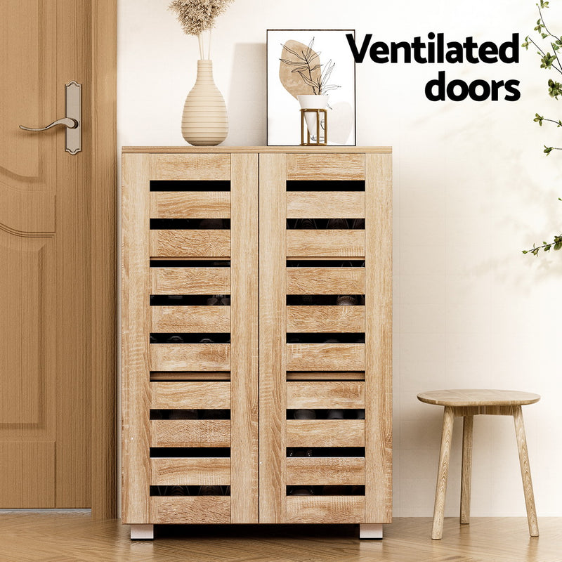 Alster shoe cabinet in pine and white with ventilated doors and adjustable shelves