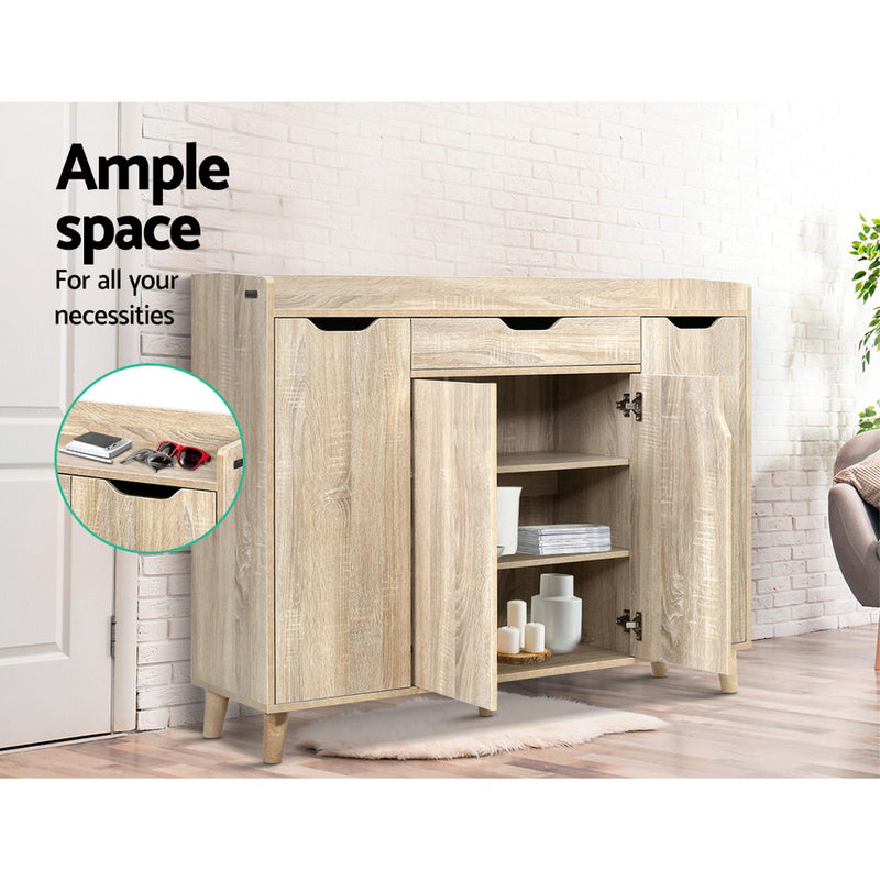 Alden 120cm shoe cabinet in pine with three enclosed storage compartments, adjustable shelves and a top drawer