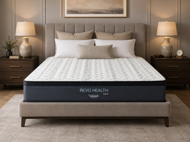 SlumberCare Revo Health Support Mattress on an upholstered bed frame